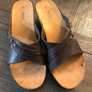 Platform brown sandals.